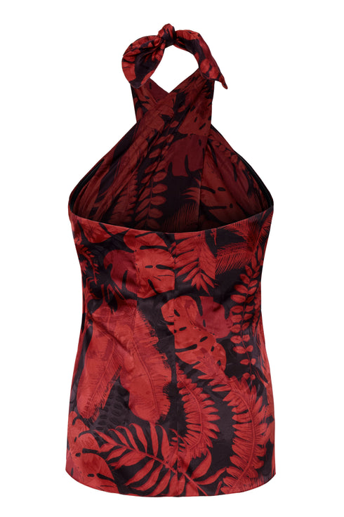 Back view of a cherry red and black rainforest jacquard silk halter blouse with a tie neck.