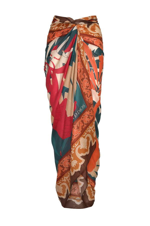 A patterned peach and brown cotton silk sarong with a dancer motif and draped front knot.