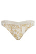Low-rise ivory bikini bottom with yellow floral embroidery and pleated side details.
