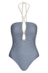 A navy and ivory striped one-piece swimsuit with a braided halter neck and front teardrop cutout.