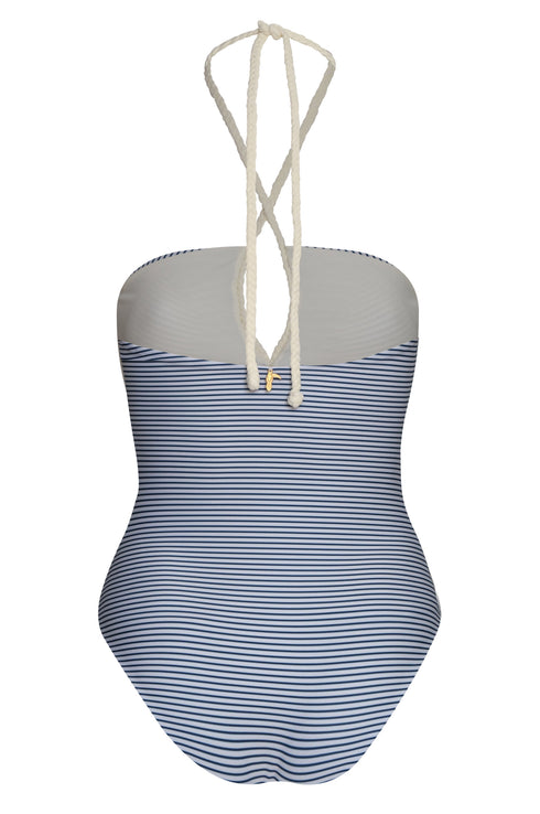 A navy and ivory striped one-piece swimsuit with a teardrop cutout and braided halter ties.