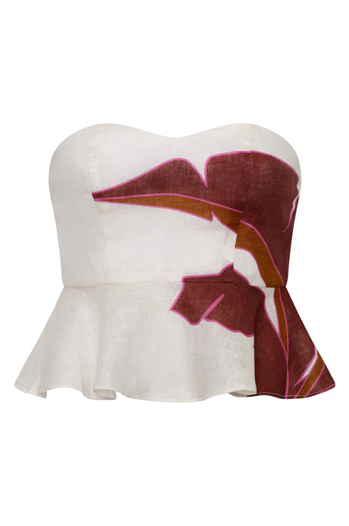 Strapless white linen peplum top with a large fuchsia and brown palm leaf motif.
