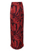 Full-length silk jacquard pants in a red and black cherry rainforest tropical leaf print.