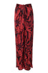 La Bamba silk jacquard pants in cherry rainforest print with a draped, skirt-like silhouette.